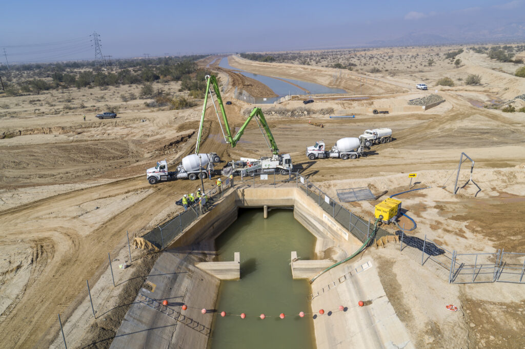 Crews work on expanding the Coachella Canal as part of the Mid-Canal Storage Project in Niland, California.