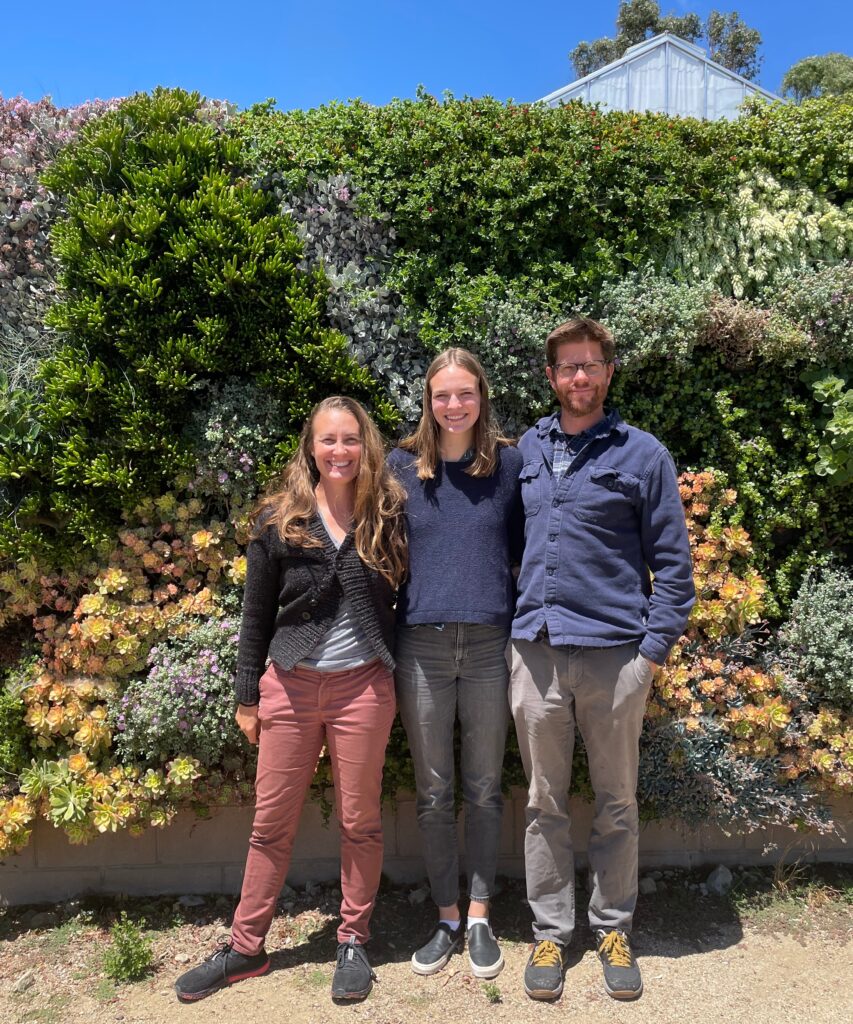 Biology Professors Jenn Yost, left, and Matt Ritter join graduate student Cami Pawlak at Cal Poly’s Plant Conservatory.