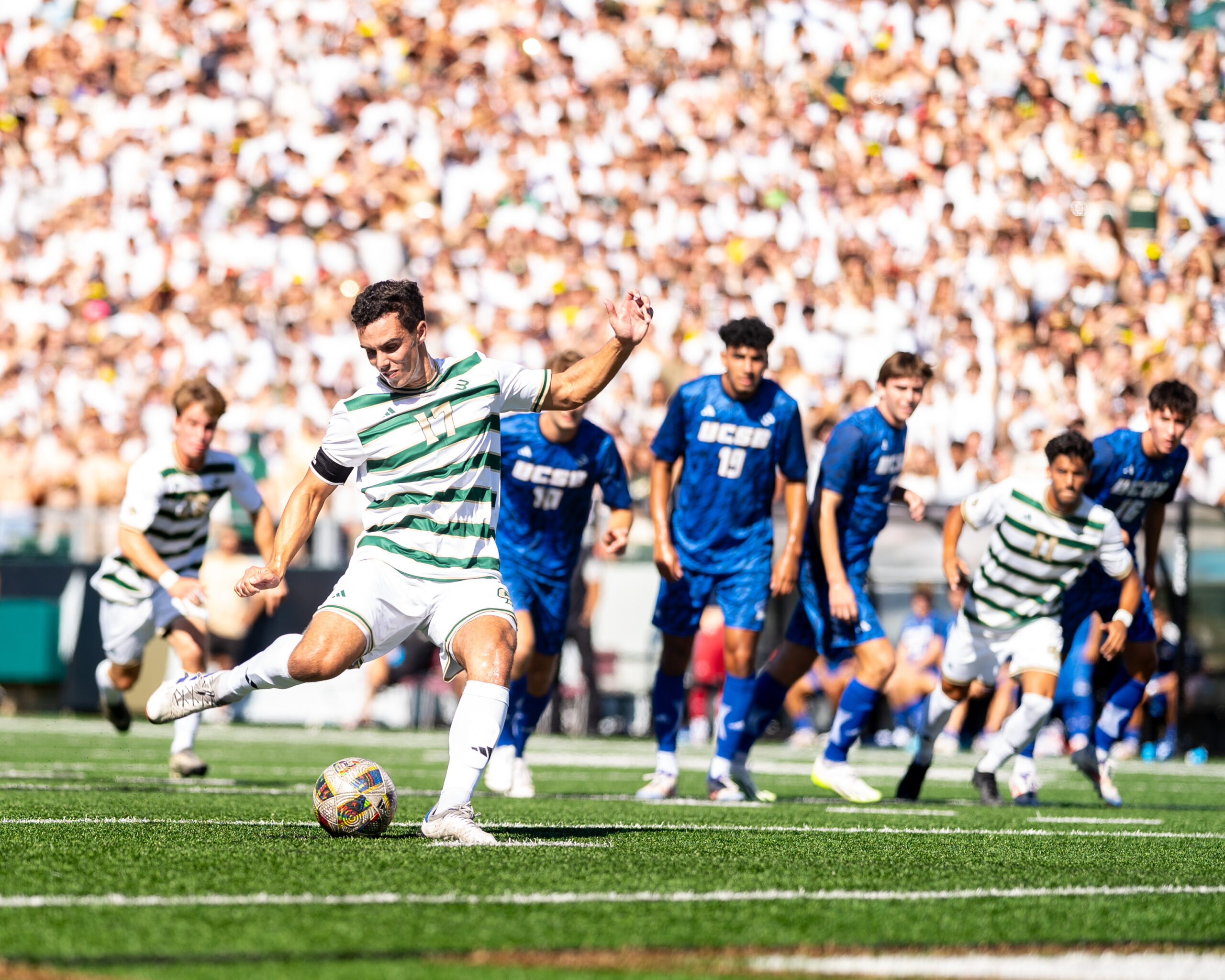 Cal Poly soccer player Nate Colley getting ready to kick the ball.